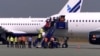 WATCH: More Than 100 Afghans Evacuated To Britain From Kosovo