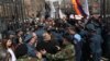 Armenia - Riot police confront anti-LGBT protesters outside the parliament building in Yerevan, April 8, 2019.