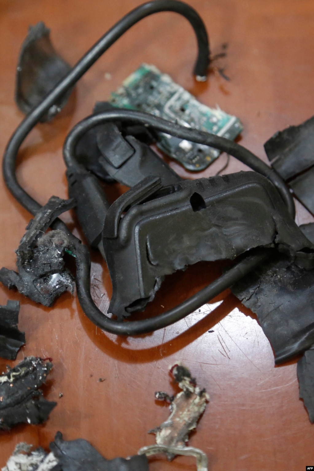 A photo taken on September 18 in Beirut’s southern suburbs shows the remains of a pager that exploded. huixrihqiqxprw