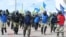 «Пратэстоўцы» на вучэньнях МУС несьлі жоўтыя, блакітныя і белыя сьцягі