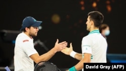 Teniseri Novak Đoković i Aslan Karacev na teniskom takmičenju "Australian Open", 2021