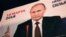 Last week, two campaign banners featuring enormous portraits of Putin in the Siberian city of Tomsk were defaced by vandals with paintball guns.