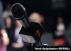 Microphone with the logo of the radio "Azattyk"