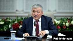 Адылбек Касымалиев.