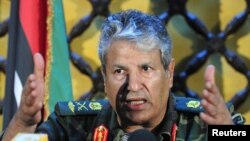 A Libyan rebel minister says Abdel Fatah Younes (pictured), the commander of the rebel armed forces, was killed by an allied Islamist militia.