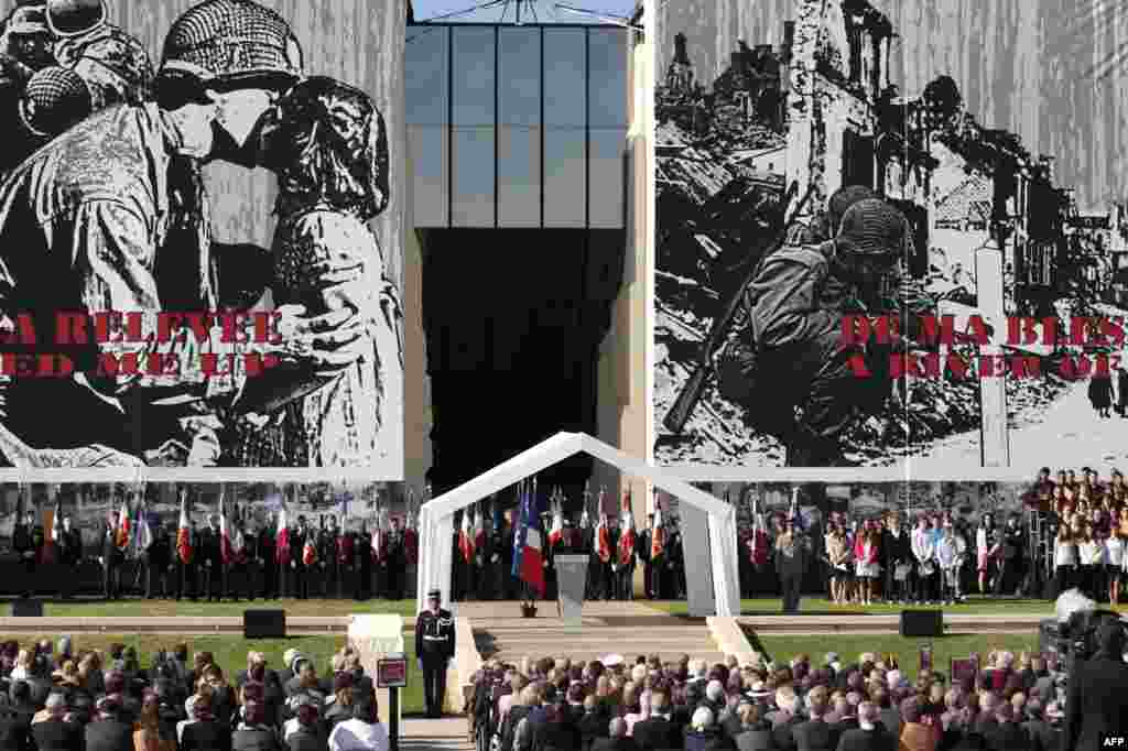 French President Francois Hollande speaks during a French D-Day commemoration ceremony at the World War II memorial in Caen.