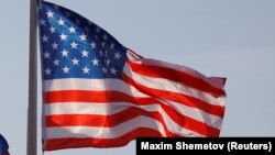 RUSSIA -- FILE PHOTO: National flags of Russia and the U.S. fly at Vnukovo International Airport in Moscow, Russia April 11, 2017. 