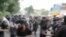 Протестувальники в Іраку втікають від пострілів (відео)