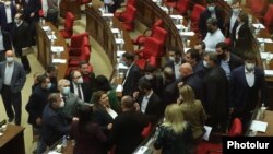 Armenia -- Pro-government and opposition deputies argue on the parliament floor, November 17, 2020.