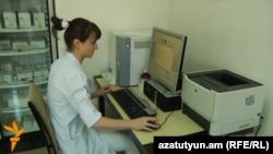 Armenia - A medic at a state policlinic in Yerevan.