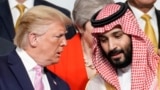 US President Donald Trump (left) speaks with Saudi Arabia's Crown Prince Muhammad bin Salman at a G20 summit in Japan in 2019.