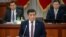 Kyrgyz President Sooronbai Jeenbekov speaking in parliament on April 11.