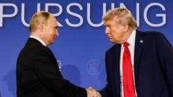 U.S. President Trump and Russian President Putin shake hands following their meeting to discuss the war in Ukraine in Anchorage, Alaska, on August 15.