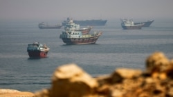 Vessels near the Strait of Hormuz, as seen from Musandam, Oman, on August 31.