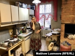 Elina Mikhaltsova in the kitchen of her home in Tomsk, which was built in 1904 and originally served as a school.