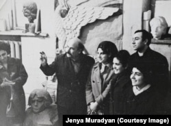 Ara Haratyunyan with Jenya Muradian and several unidentified people in Haratyunyan's studio in the 1960s