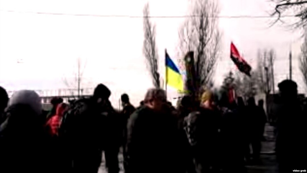 A screen grab from a live stream from Kharkiv at the scene after a deadly explosion at a "Dignity March" on February 22