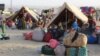 Afghan refugees at a makeshift shelter camp in Chaman, a Pakistani border town, after the Taliban's takeover of Afghanistan in August 2021.