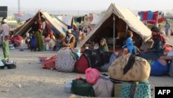 Afghan refugees at a makeshift shelter camp in Chaman, a Pakistani border town, after the Taliban's takeover of Afghanistan in August 2021.