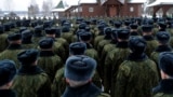 Belarus -- Belarusian soldiers take part in an Orthodox service in a military base in Minsk, January 7, 2016