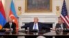 U.S. President Donald Trump (C), Azerbaijani President Ilham Aliyev (L) and Armenian Prime Minister Nikol Pashinian during a meeting in the State Dining Room of the White House in Washington, DC, on August 8, 2025.