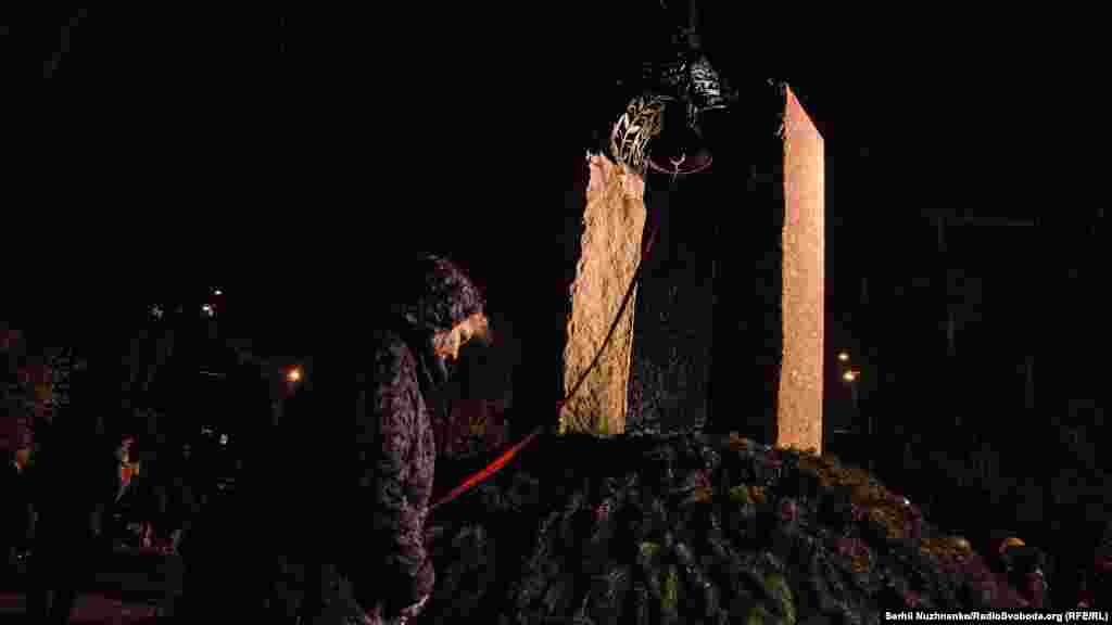 Ukraine -- Honoring Chornobyl liquidators in Kyiv near Chernobyl church, 26Apr2016