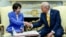 US President Donald Trump shakes hands with Japanese Prime Minister Sanae Takaichi in the Oval Office at the White House in Washington on March 19.