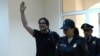 Armenia - Opposition activist Andrias Ghukasian waves to supporters in a courtroom in Yerevan, 7 May 2018.