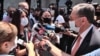 Armenian Foreign Minister Zohrab Mnatsakanian talking to protesters outside the government offices in Yerevan, August 12, 2020.