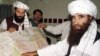 FILE: The Haqqani network is named after Jalaluddin Haqqani (R).