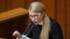 Yulia Tymoshenko, Ukraine's former prime minister, received a settlement from a U.S. law firm to avoid a suit, The New York Times reported. (file photo)