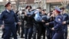 KAZAKHSTAN -- Police officers detain anti-government protesters during a rally in Almaty, Kazakhstan March 22, 2019. 