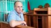 Belarusian journalist Syarhey Hardzievich in a courtroom in Minsk on August 2.