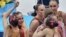 Russia's synchronized swimmers celebrate winning the gold medal.