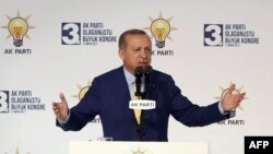 Turkish President Tayyip Erdogan delivers a speech on May 21, 2017