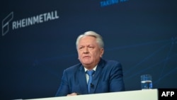 Armin Papperger, CEO la Rheinmetall, adresându-se unei conferințe de bilanț la sediul din Duesseldorf al companiei, la 14 martie 2024.