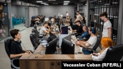 Grup de angajați dintr-o companie IT. Imagine generică.