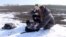 Ukraine - researchers near the Polokhiv lithium deposit, near the town of Kopanky - screen grab - mining mine 