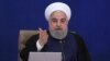 Then-Iranian President Hassan Rohani attends a ministerial council meeting in Tehran in May 2021.