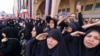 Mourners react as they pay their respects at the Grand Mosalla where they gathered to pray for Iran's slain supreme leader Ayatollah Ali Khamenei during the second day of funeral ceremonies in Tehran on July 5, 2026.