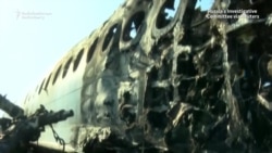 Russian Inspectors Probe Plane's Wreckage After Deadly Fire