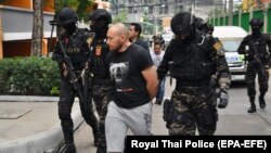 Infraud co-founder and administrator Sergei Medvedev, shown here at his arrest in Thailand in February 2018, pleaded guilty to similar charges last month.