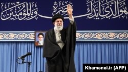 Iranian supreme leader Ali Khamenei waves to the crowd during an event held in Tehran, February 5, 2020