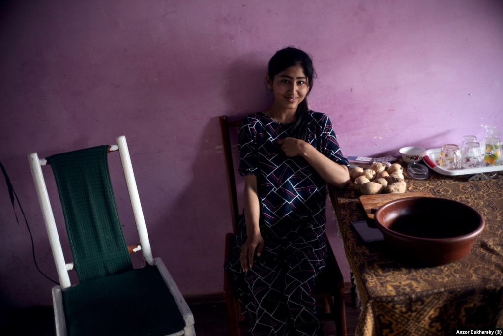 A local of Khiva photographed in her home.