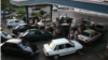 Car line up at a gas station in Tehran on August 27 as the country faces a shortage of fuel reserves.