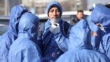 Kazakhstan - Specialists wearing protective gear sanitize public facilities to prevent the spread of coronavirus disease (COVID-19) in Almaty, Kazakhstan March 27, 2020. REUTERS/Pavel Mikheyev