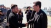 UK Prime Minister Andy Burnham (right) greets Ukrainian President Volodymyr Zelenskyy as they view Ukrainian equipment and meet Ukrainian personnel during a visit to a naval base in Portsmouth on July 27. 