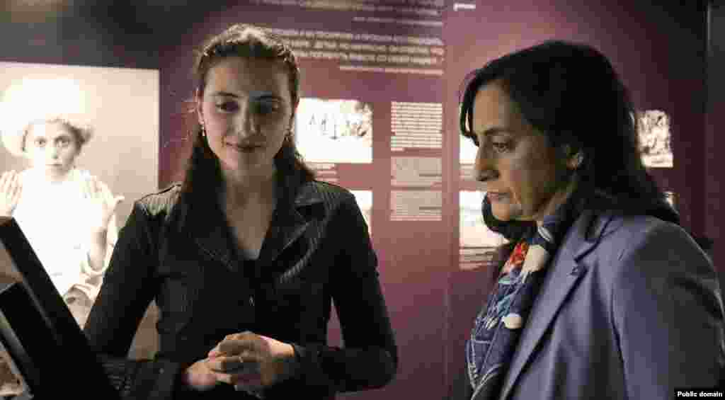 Canadian Foreign Minister Anita Anand (right) visits the museum within the Armenian Genocide Memorial on May 3.