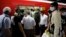 Iranians, mostly wearing face masks, are pictured at a metro station in the capital Tehran on June 10, 2020 amid the coronavirus Covid-19 pandemic crisis. 