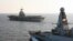 File - The British Royal Navy warship HMS Defender, or Daring-class air-defense destroyer, joins the French aircraft carrier, Charles de Gaulle, ready to support operations against Islamic State (IS) in the Indian Ocean, December 13, 2015